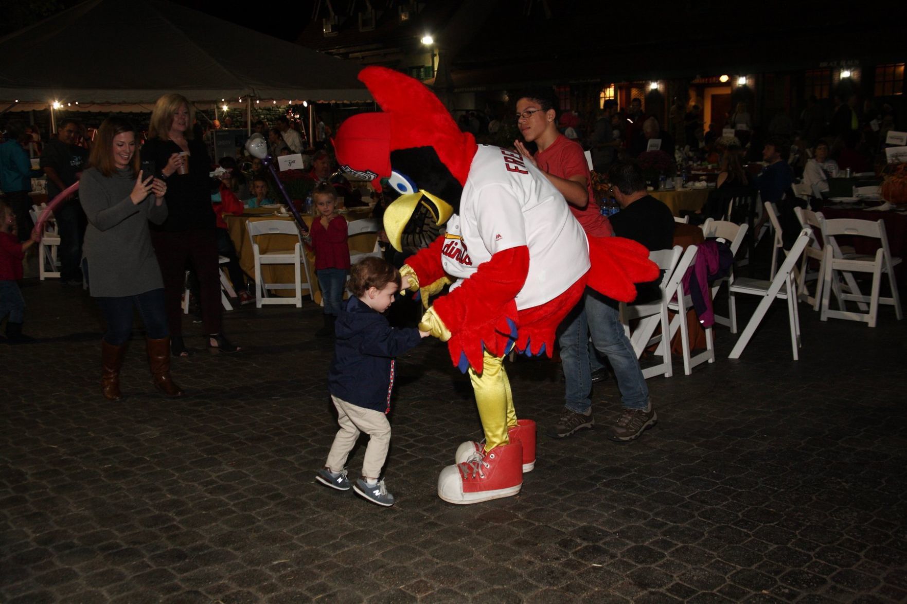 A fan dancing with Fredbird